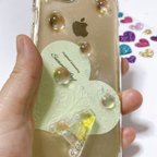 作品【オーダー制】スマホケース レジン シャボン玉  イニシャル入れ オルゴナイト お守り 願い ストーン 選べる オーダー