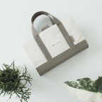 作品《予約販売》白とモカ 帆布 の レビューブックカバー tote