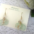 作品ゆれる花びら×白い小枝のピアス| MINTGREEN