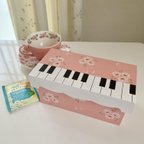 作品ピアノ鍵盤模様のティーストッカー（ピンク）　　　　トールペイント