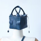 作品「帆布×革の組み合わせ」本革レザー編みハンドバッグショルダートートバッグ 巾着袋 肩掛け 鞄