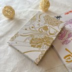 作品【再販】御朱印帳 大判Lサイズ  華文飛翔鳳凰 (白)  西陣織金襴生地使用