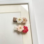 作品【ベビークリップ】ゴールドラメのお花のベビークリップ