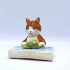 作品絵本を読む猫～河童の宝さがし～