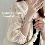 作品｡.*beads ribbon hand strap*.｡〜うねうねiPhone case〜　スマホケース　ハンドストラップ