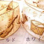 作品【一巻18m】楽器のワイヤー入りリボン 　ホワイト　音楽・音符・楽譜柄　(幅64mm)