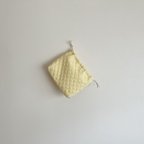 作品【pouch】カモミールカラーのキルティング生地で作った巾着袋・ポーチ（マチあり）