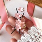 作品 【片耳用】紙で作る　枝付き桜のイヤーカフ　左耳