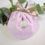 作品【手刺繍のぷっくり巾着 (かすみ草)】