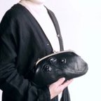 作品スワロフスキーの飾りのあるオイルレザーハンドバッグ