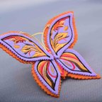 作品Retro-style butterfly embroidery brooch charm, lavender and orange レトロ風蝶々の刺繍ブローチチャーム　ラベンダーxオレンジ