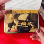 作品猫の名画の透明栞『ピアノレッスン』　クニップの名画