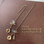 作品シトリンとスカイブルートパーズのアメリカンピアス