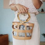 作品˚✧₊真夏の陽射しに映えるキラキラ巾着 in Leather bag ブルーペイズリー⁎⁺˳✧༚