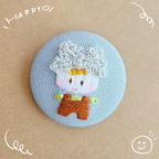 作品ベイビーの刺繍くるみボタン(選べるブロ―チorヘアゴム)