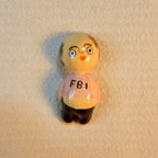 作品腹出しおじさん箸置き（FBI）