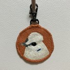 作品烏骨鶏の手刺繍ストラップ〈オレンジ〉