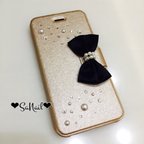 作品iPhone手帳型ケース♡リボン×スワロ♡キラキラデコケース