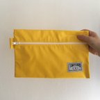 作品Tarpaulin Flat Pouch M【Yellow】