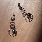 作品再販𓇽個性派必見👀ぐるぐるメタルシルバーのアクセサリー