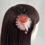 作品はな手毬。水引細工のヘアクリップ（ピンク）