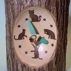 作品無垢の木から削りだして猫のシルエット文字盤をあしらえた猫置時計・猫掛け時計