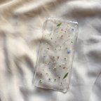 作品【オーダーメイド】"まるでお花畑のようなiPhoneケース💐"