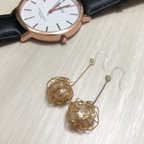 作品コットンパールのぐるぐるピアス