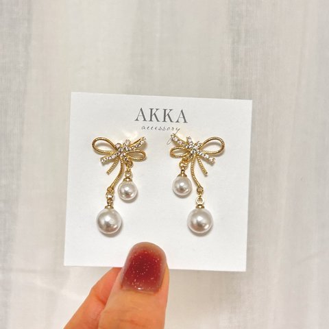 Pearl ribbon bijou earringsパールリボンビジュー 樹脂イヤリング　樹脂ピアス　金属アレルギー対応　ノンホールピアス　リボンのアクセサリー　大人可愛い　ウエディング　お呼ばれ