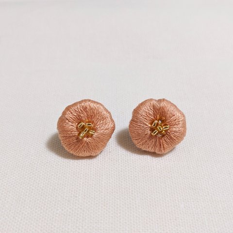 オレンジのお花のピアス