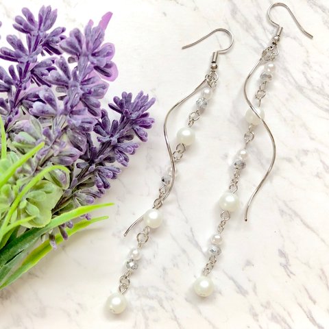 silver twist long earrings 