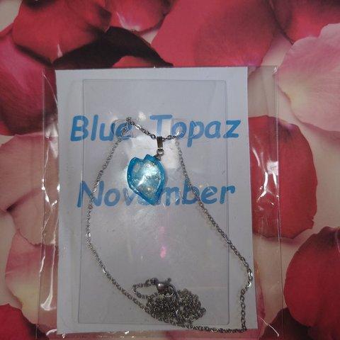 blue topaz petal silver necklace 1