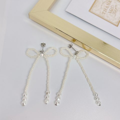 パールリボンピアス🎀　イヤリング　ホワイト