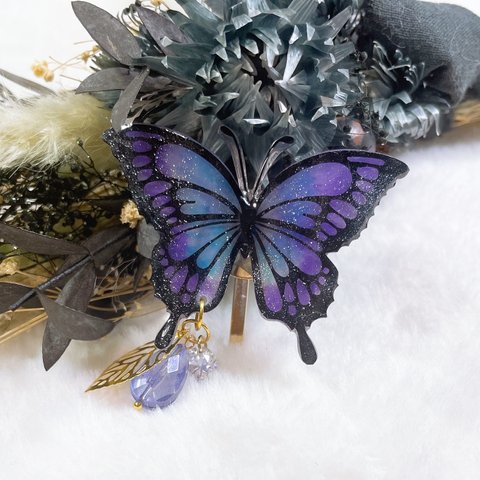 幸せを招く紫の蝶のポニーフック