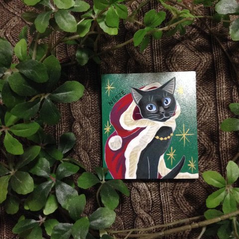 黒猫のクリスマスのイラスト