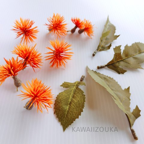 新作★オレンジ色のポンポンが可愛い造花と葉っぱミックス