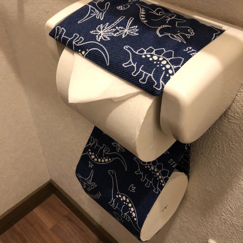 恐竜のトイレットペーパーホルダー