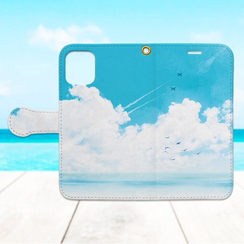 iPhone Android 青空と海と飛行機雲の手帳型スマホケース ベルトなし対応 カメラ穴付きはめ込み式 多機種対応