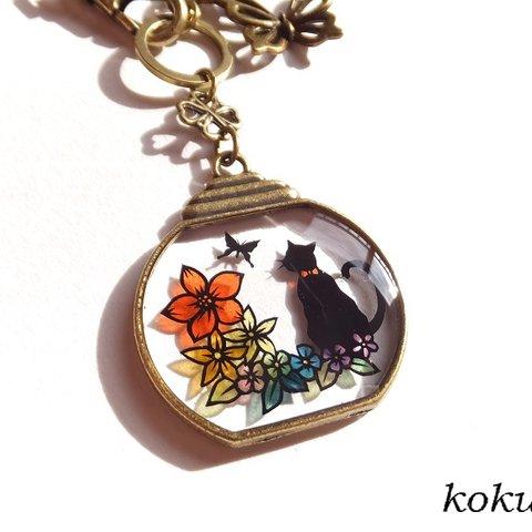 【切り絵レジン】花と蝶と黒猫　バッグチャーム