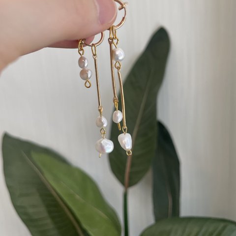 45. asymmetry pearl earring