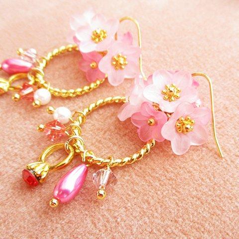 リングとスワロの揺れるピアス/イヤリング（桜色の花）