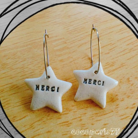 星のピアス　merci