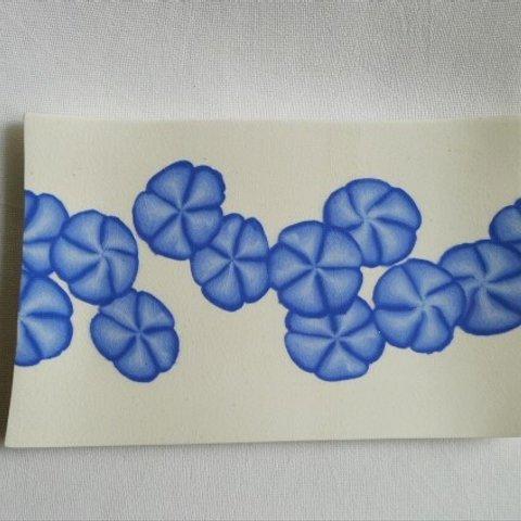 青と白の練り上げお花模様風皿