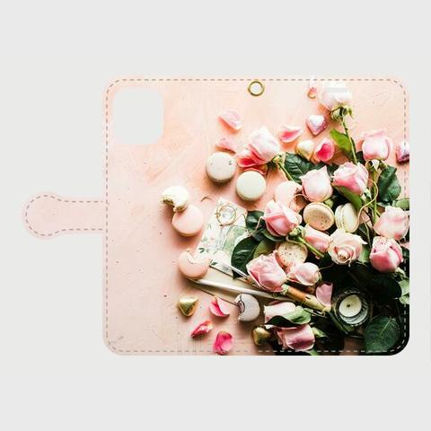 かわいいピンクのバラとマカロンのデザインスマホケース　手帳型