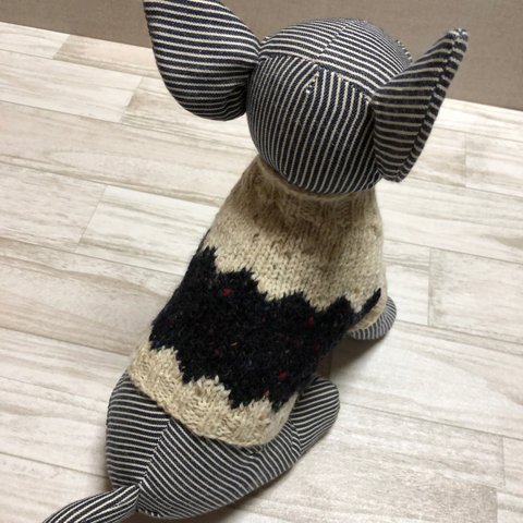 ギザギザの編み込みセーター（黒カラーネップ）