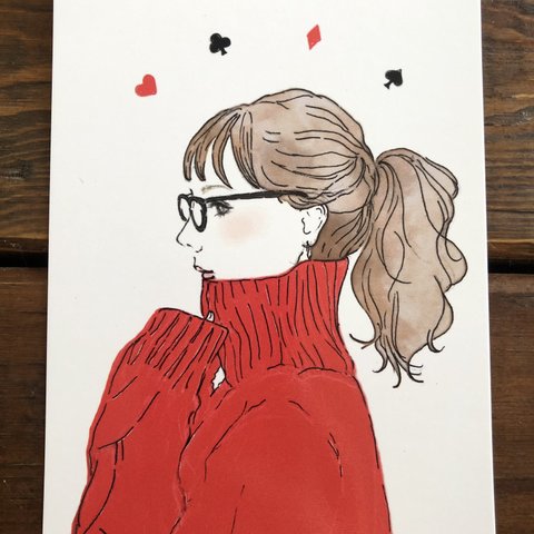 ⑦赤いセーターの女の子