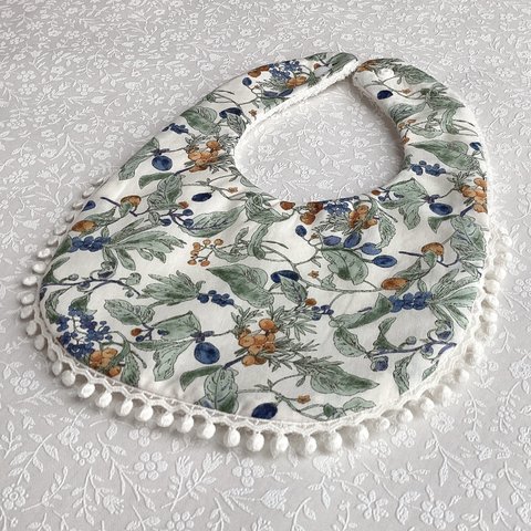 Botanical pompom bib