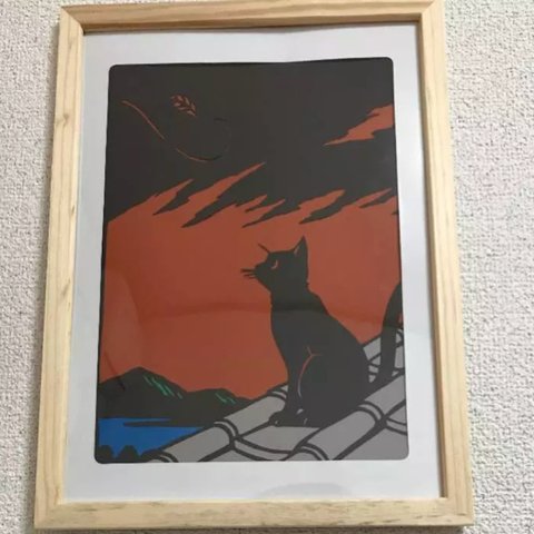 夕焼けと黒猫