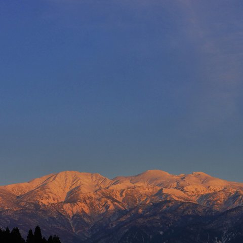 壁にかけられる写真パネル「白山夕景」