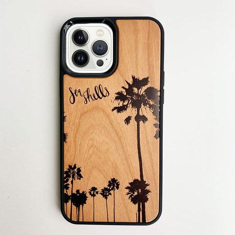 ヤシの木のウッドパネルiphoneケース　衝撃吸収　西海岸風デザインケース　パームツリーのシルエットデザイン　ハワイアン